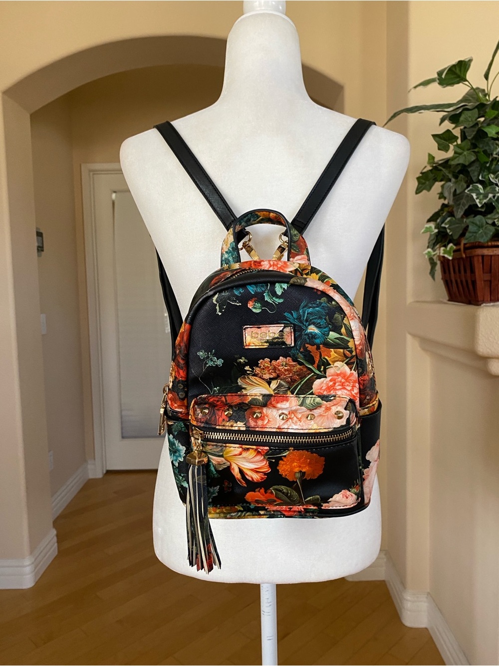 Floral-Print Black Mini Backpack with Tassel Accent